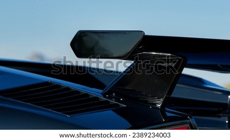 Rear spoiler on a black car