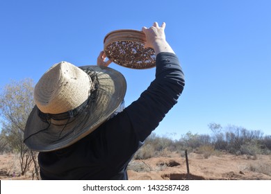 Rear View Of An Adult Australian Woman Fossicking (searching)  Gem Stones In The Outback Of The Northern Territory, Australia. Real People. Copy Space