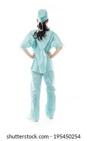 Rear View Of An Asian Female Surgeon Standing With Hands On Hip