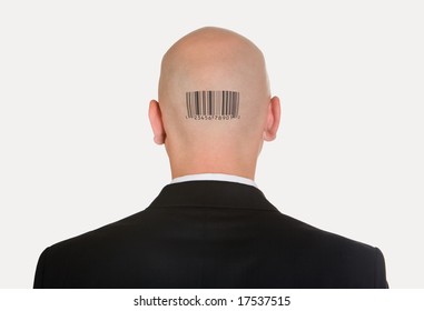 Rear view of bald head with barcode on its back