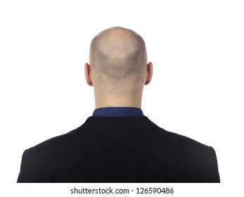 Rear view of a bald mid adult businessman looking at white background,