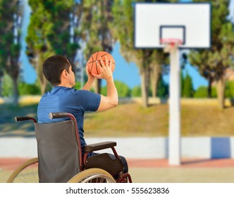 rear view of a basketball player in free throw pose in wheelchair at oudoors - Powered by Shutterstock