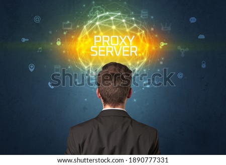 Rear view of a businessman with PROXY SERVER inscription, online security concept