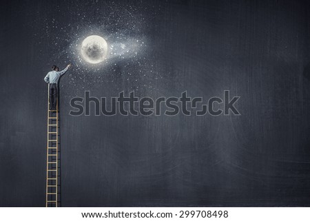 Rear view of businessman standing on top of ladder