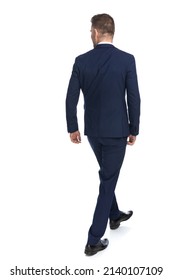 Rear View Of A Businessman Walking In One Direction And Looking The Opposite One Against White Background