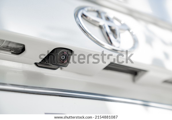 rear view camera and the Toyota logo on the\
car. purchase and sale of new cars in the salon. official\
dealership. Russia, Rostov-on-Don,\
04.04.2022