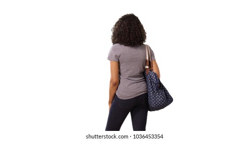 Rear View Of Casual Black Woman Posing With Purse On White Background