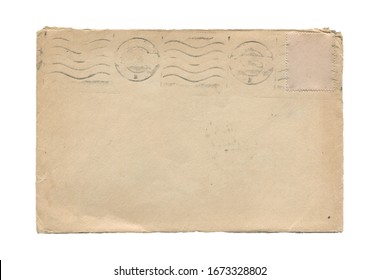rear view closeup of blank old aged open letter paper envelope with torn edges and faded postage stamp print isolated on white background