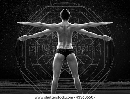 Rear view portrait of one young middle age athletic woman at crossfit training, exercising with trx suspension fitness straps over dark background