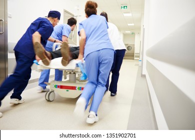 Rear view of doctors running for the surgery  - Shutterstock ID 1351902701