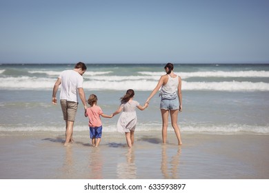 Three Happy Children Running On Beach Stock Photo (Edit Now) 1023380341