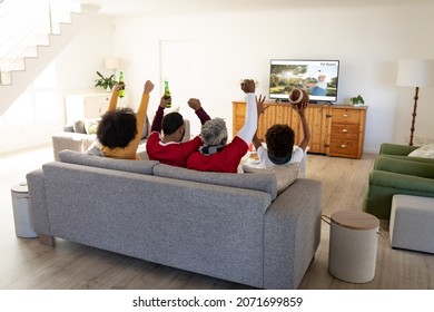 Rear View Of Family Sitting At Home Together Watching Golf Event On Tv. Sports, Competition, Entertainment And Technology Concept Digital Composite Image.