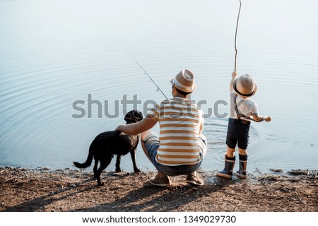 Similar – Boy at the lake