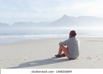 44,234 Man sitting on sand Images, Stock Photos & Vectors | Shutterstock