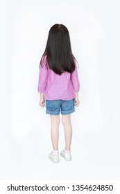 Rear View Little Asian Child Girl Standing With Long Hair Isolated Over White Background.