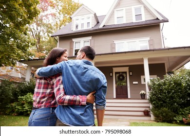 Rear View Of Loving Couple Walking Towards House - Shutterstock ID 795098068