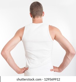 Rear View Of A Male Torso Wearing A Sleeveless Shirt