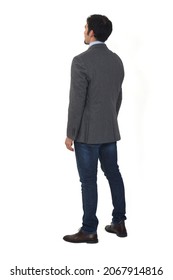 Rear View Of A Man With Blazer And Jeans On White Background