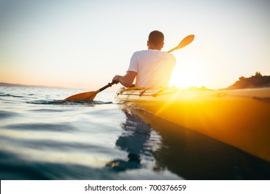 Rear View Man Paddling Canoe Paddling Stock Photo (Edit Now) 700376665