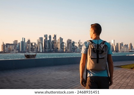 Similar – Image, Stock Photo Man traveling solo by train looking outside the window