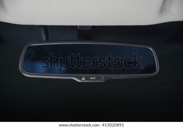 rear\
view mirror inside interior passenger cabin\
room