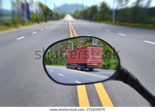 Rear View\
Mirror Reflecting Road,Truck driving\
