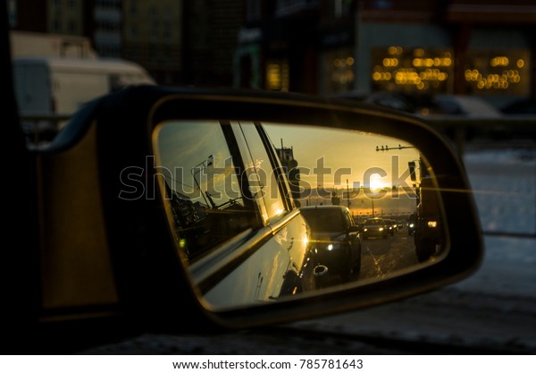 Rear View Mirror\
Reflection on sun down