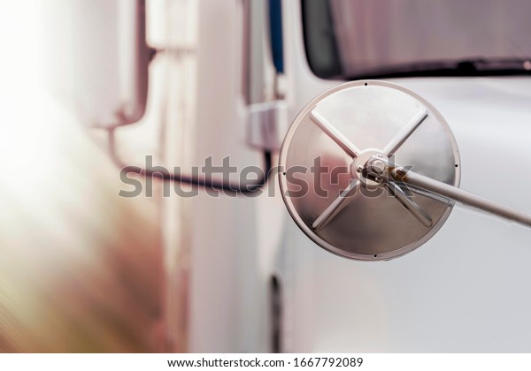 the rear view mirror of the truck close-up.\
trucking industry