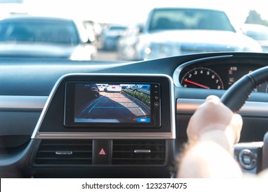 Rear View Monitor For Car Reverse System. Rear Area Image Showing To Driver By Video Camera At Rear Area To Help For Parking And Prevent Accident. Automotive Safety Technology Equipment.