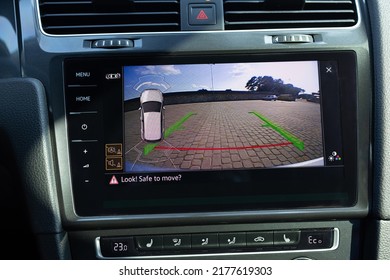 Rear View Monitor For Car Reverse System. Car Display And Rear View Camera. Parking Assistant Inside Car. Video Parking System In Modern Car. Automotive Safety Technology Equipment.