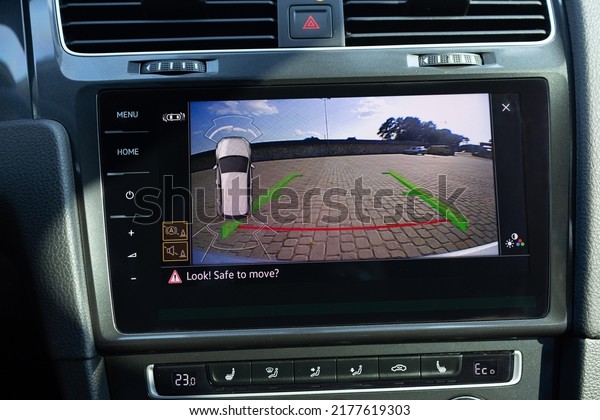 Rear
View Monitor for car reverse system. Car display and rear view
camera. Parking assistant inside car. Video parking system in
modern car. Automotive safety technology
equipment.