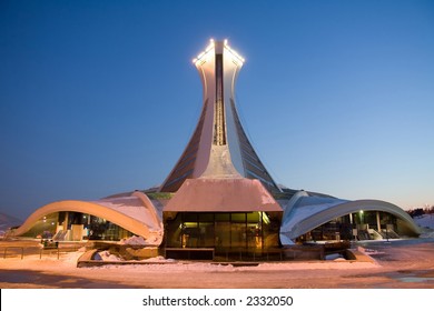 Rear View Of The Montreal Olympic Stadium And The World's Tallest Inclined Tower. Taken At Dusk In Winter.