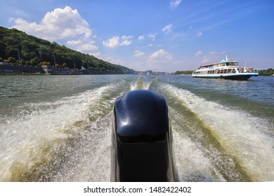 Rear View Of Motor Boat With Water Wake