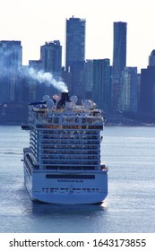 Rear View Of NCL Norwegian Bliss Anchored In Vancover Harbour. Vancouver City In The Background. Vancouver, BC/Canada/September 30th 2019