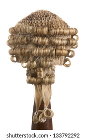 Rear view on an antique horsehair barrister's wig on white