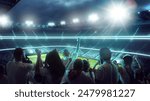 Rear view photo of excited sports enthusiasts, raising hands show their support as they fill stands of sleek and modern arena. Concept of support, international match, betting, games, final. Ad