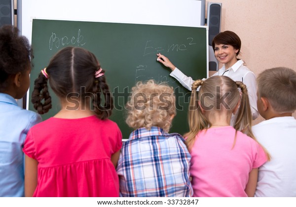 Rear View Pupils Listening Their Teacher Stock Photo (Edit Now) 33732847