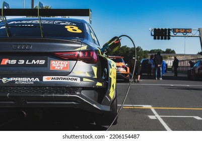 Rear View Of Racing Car Audi RS3 Standing In Racetrack Starting Grid Driver Point Of View. Vallelunga, Italy, September 17-18 2022, Racing Weekend