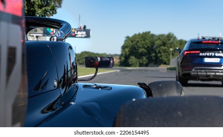 Rear View Of Racing Formula Car Standing In Racetrack Starting Grid Pole Position Driver Point Of View. Vallelunga, Italy, September 17-18 2022, Racing Weekend