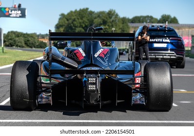 Rear View Of Racing Formula Car Standing In Racetrack Starting Grid Pole Position Driver Point Of View. Vallelunga, Italy, September 17-18 2022, Racing Weekend