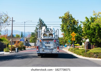 Rear View Of Santa Clara County Fire Department Ladder Truck 71 En Route To An EMS Call In Residential Neighborhood - Sunnyvale, California, USA - 2020