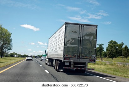 Rear View Of Semi Trailer On Highway