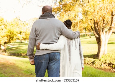 Rear view of senior peaceful couple in parkland