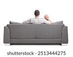 Rear view shot of a man sitting on a sofa and eating popcorn isolated on white background