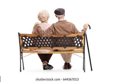 Rear View Shot Of A Senior Couple Sitting On A Bench Isolated On White Background