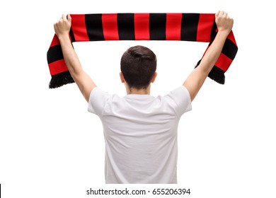 Rear View Shot Of A Teenage Soccer Fan Holding A Scarf Isolated On White Background