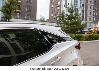 Rear view of the side doors of a shiny polished car. - Shutterstock ID 2081042506
