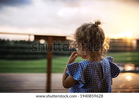 Similar – Image, Stock Photo Woman at dusk on the beach