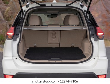 Rear View Of A SUV Car With Open Trunk