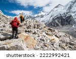 Rear view of tourist while trekking to Everest Base Camp in Nepal. Everest Base Camp Trek is undoubtedly the adventure of a lifetime and one of Nepal